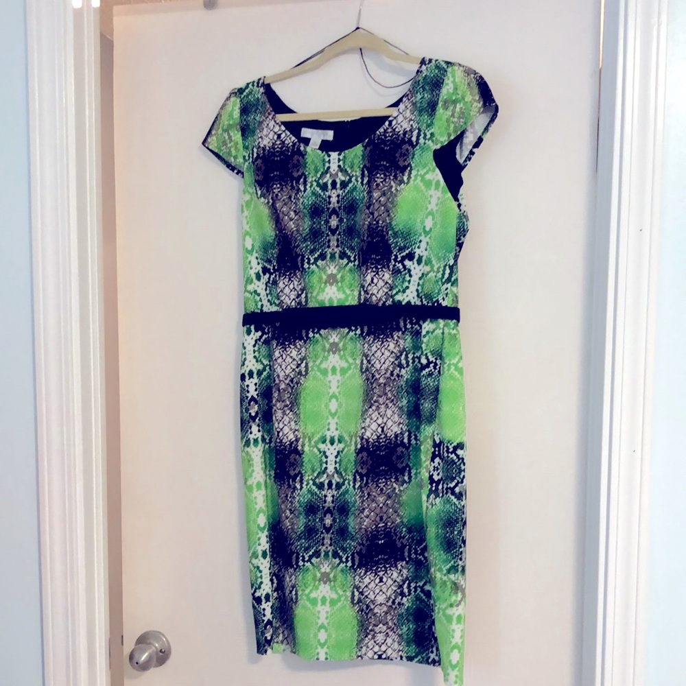Sizzle in a tasteful snakeskin cocktail dress!